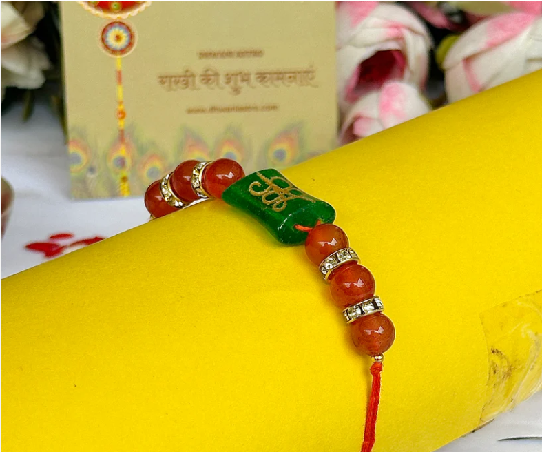 Red Carnelian Money Coin Reiki Symbol Rakhi - Abhimantrit